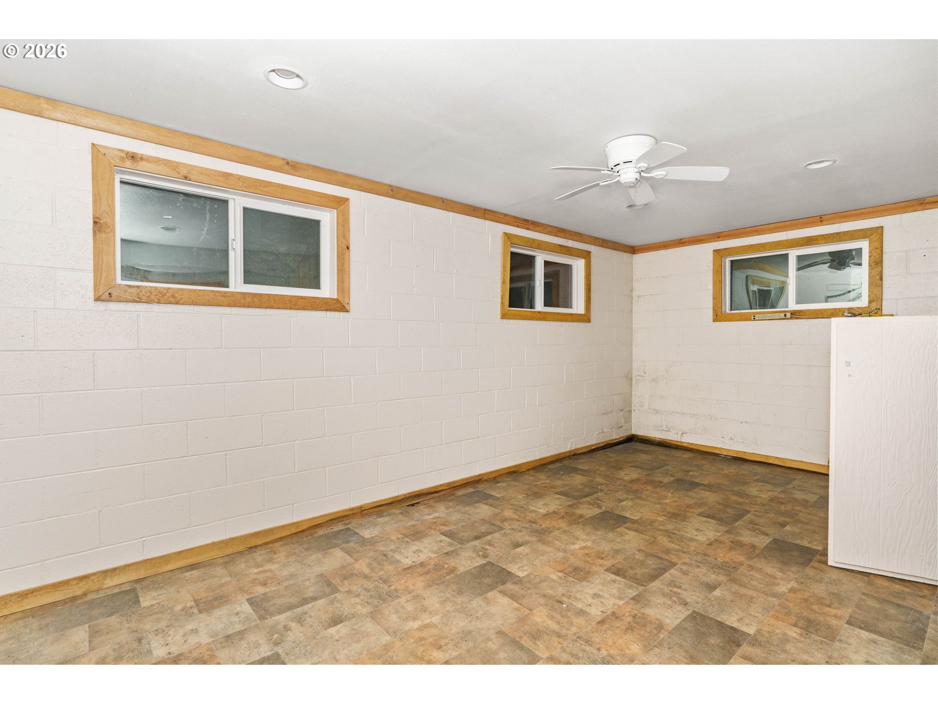 7470 Maple Creek Road Westlake, OR 97493 - Photo 21 of 33 a view of an empty room with a window