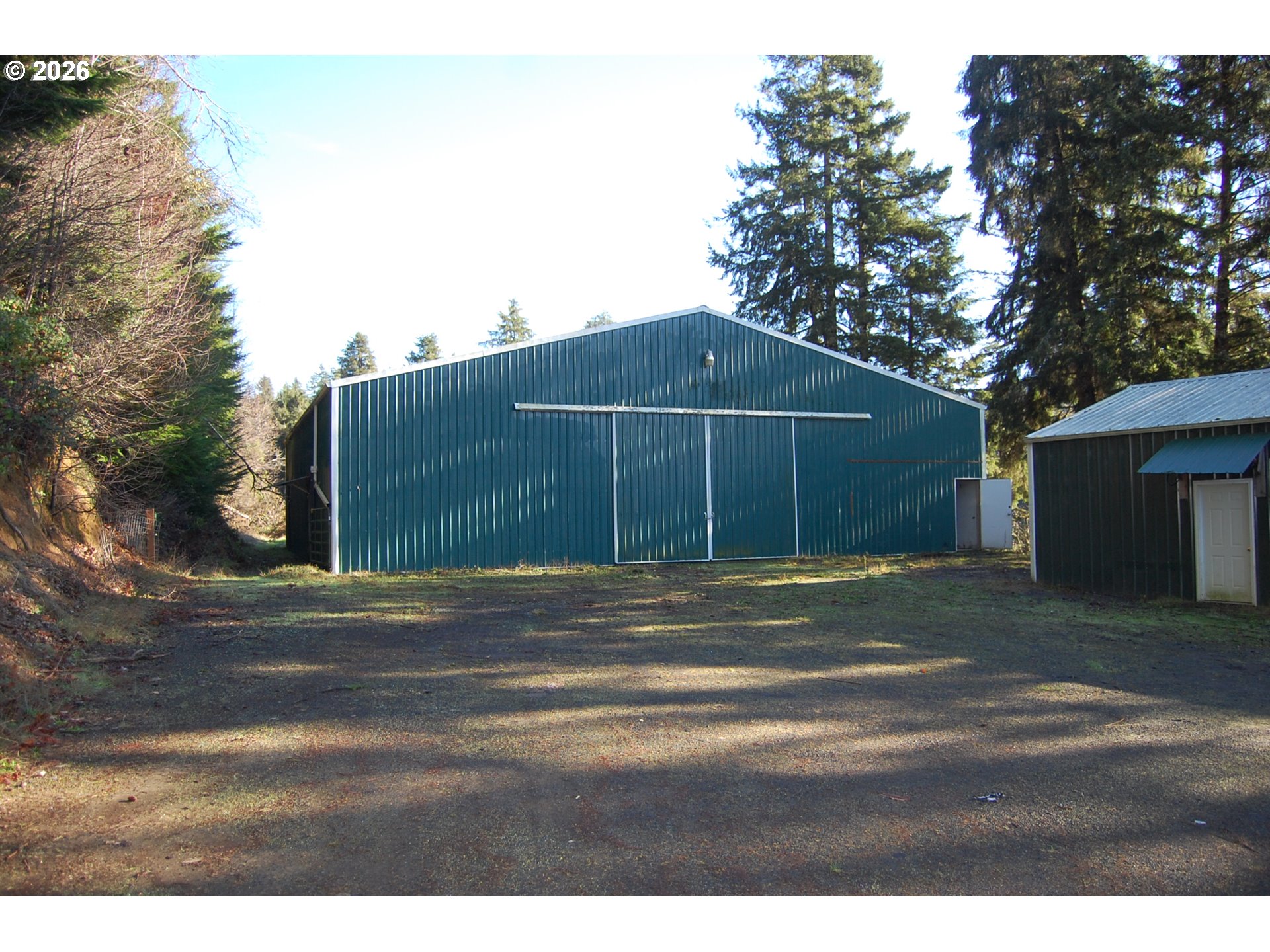 7470 Maple Creek Road Westlake, OR 97493 - Photo 30 of 33 a front view of a house with a yard