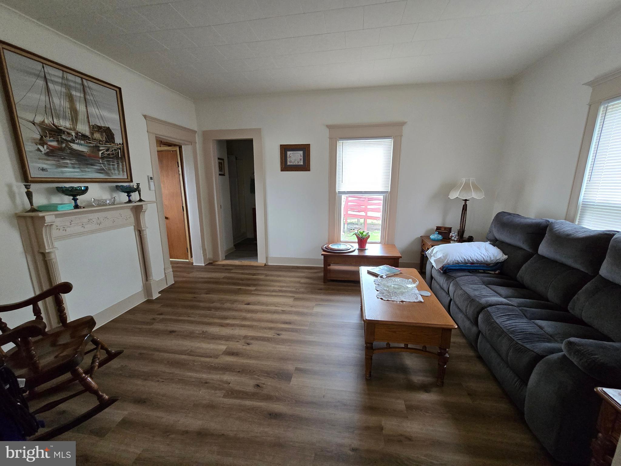 205 Myrtle Street Crisfield, MD 21817 - Photo 24 of 56 a living room with furniture and a wooden floor