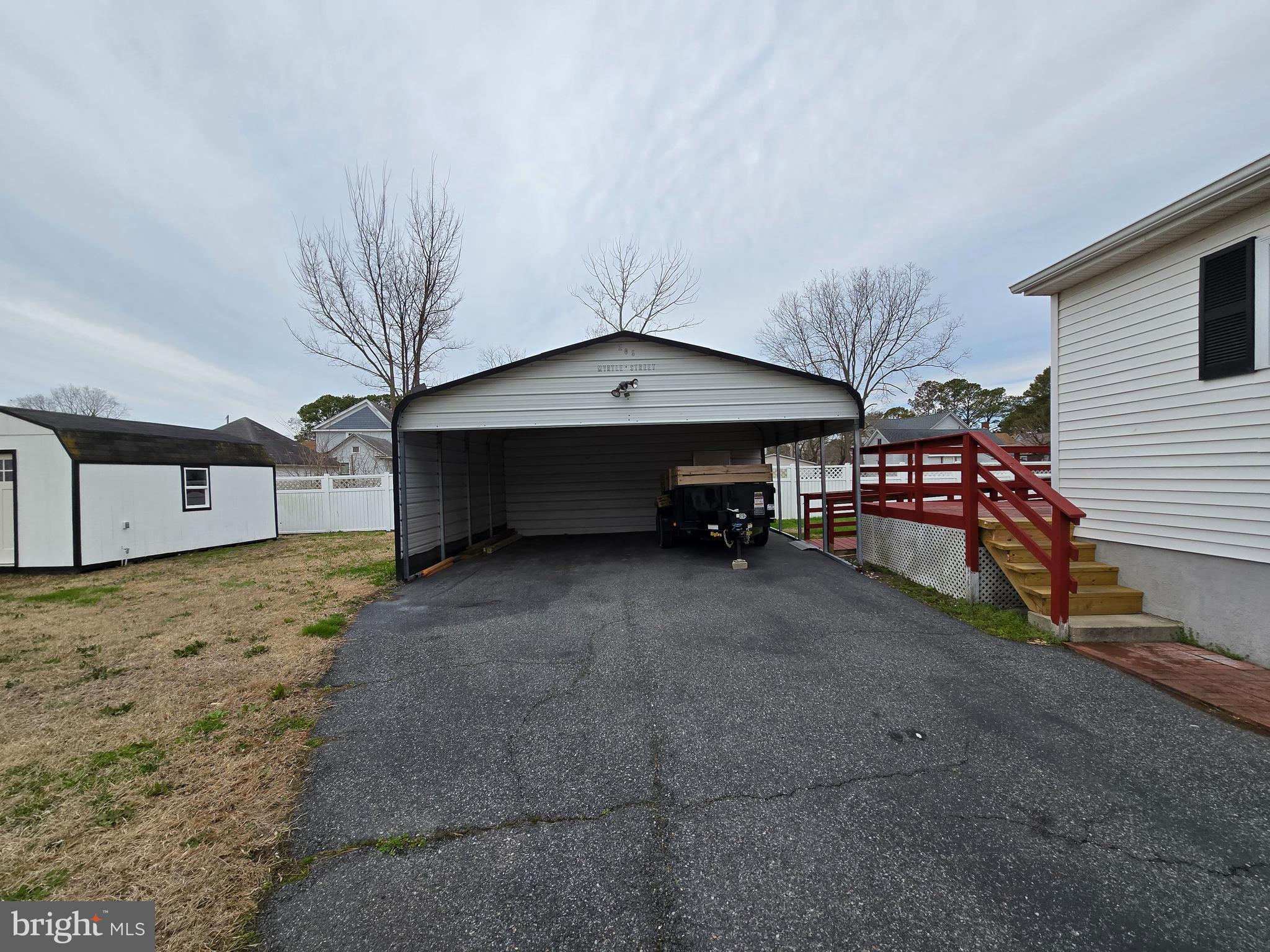 205 Myrtle Street Crisfield, MD 21817 - Photo 36 of 56 a view of a house with a yard and furniture