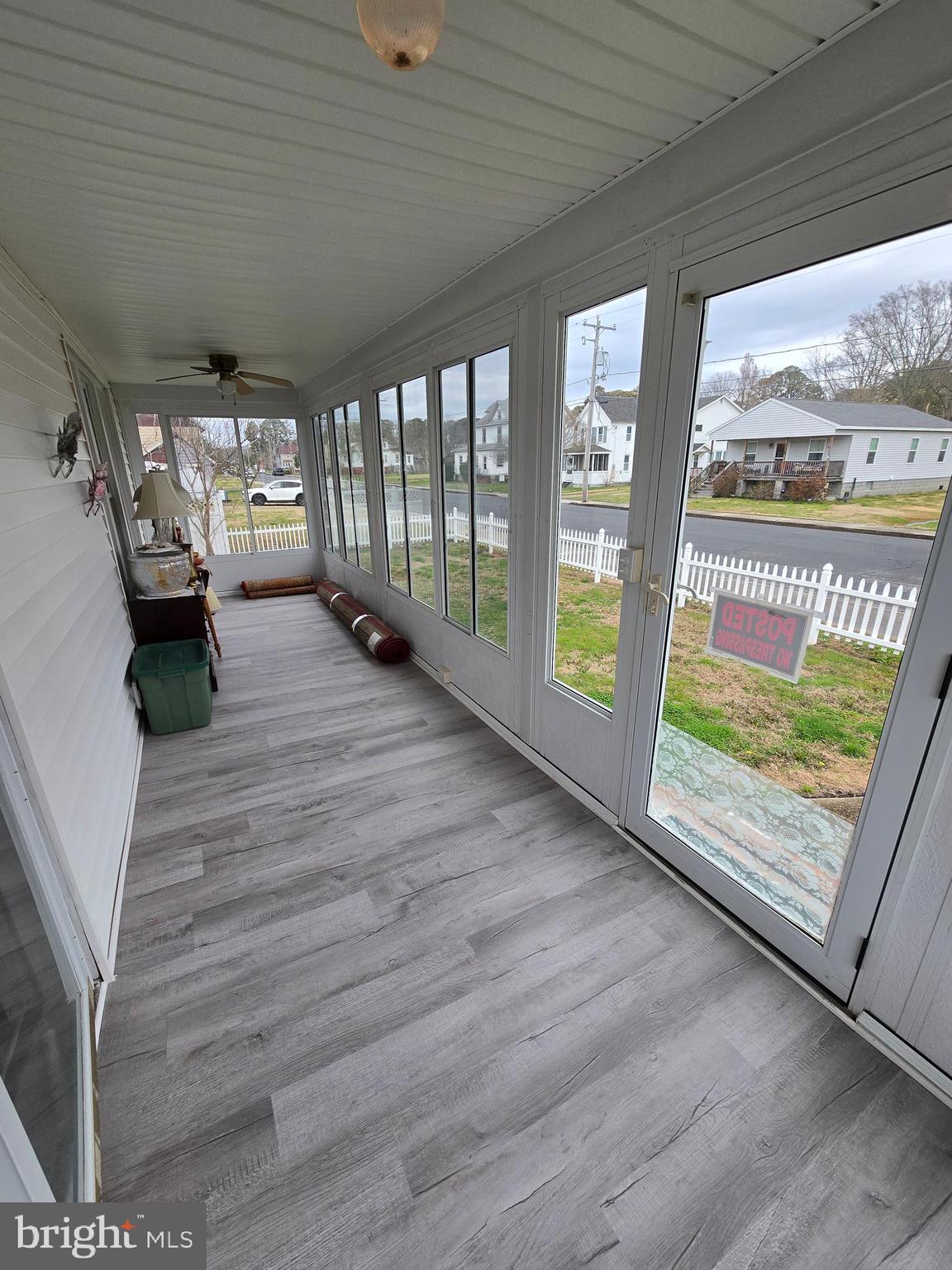 205 Myrtle Street Crisfield, MD 21817 - Photo 7 of 56 a view of an empty room with a window