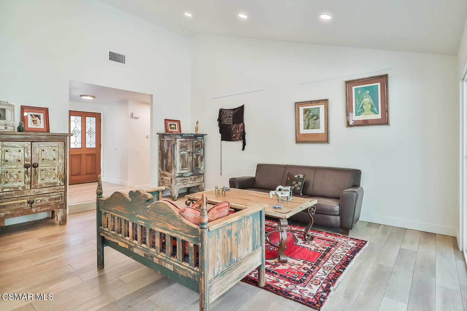 252 Rancho Road Thousand Oaks, CA 91362 - Photo 13 of 56 a bed room with furniture and paintings on the wall