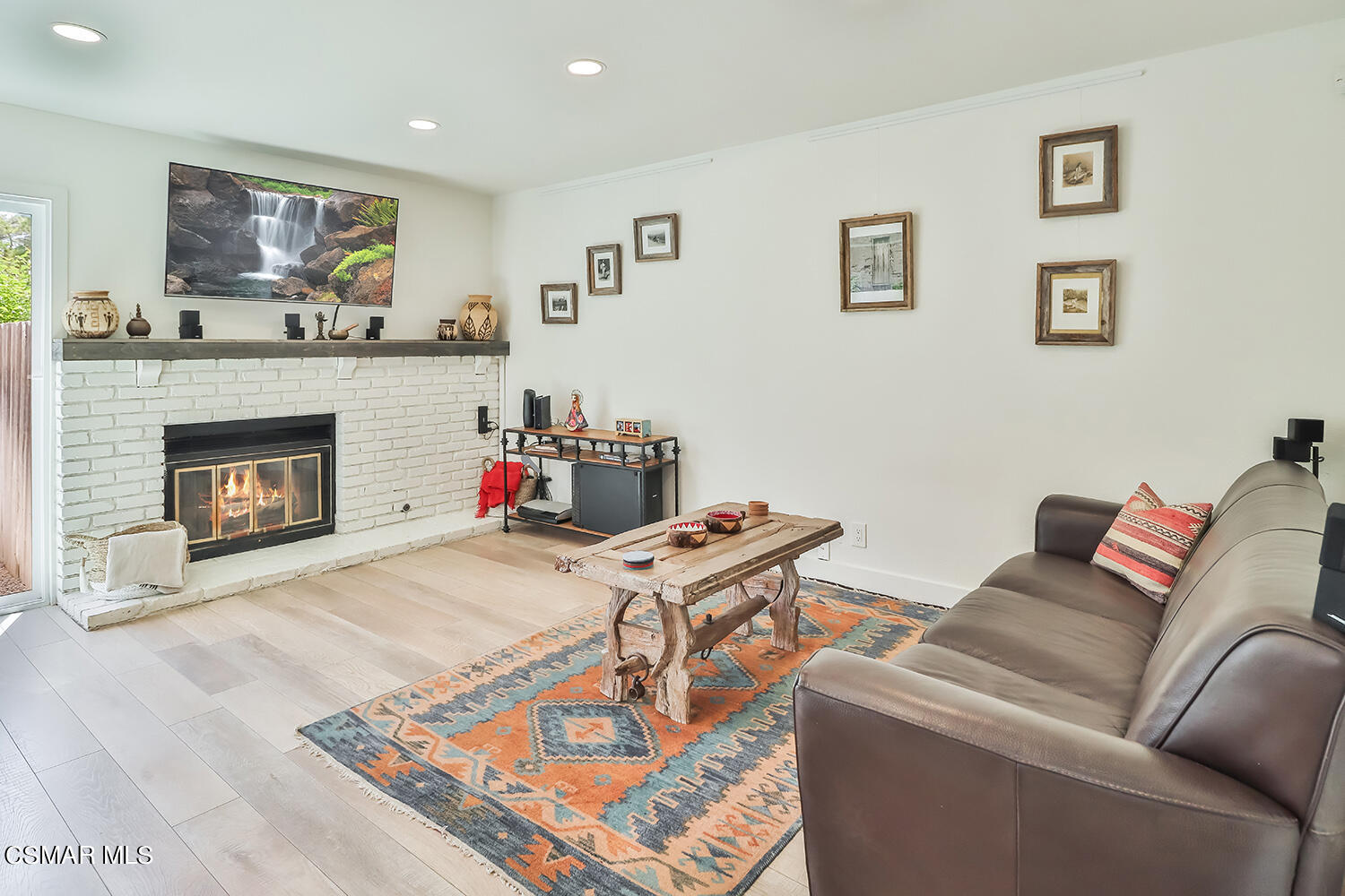 252 Rancho Road Thousand Oaks, CA 91362 - Photo 17 of 56 a living room with furniture and a fireplace