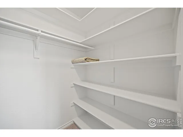 a view of small space with racks on the wall