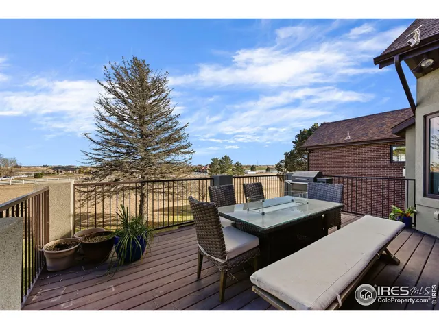 a view of a terrace with furniture
