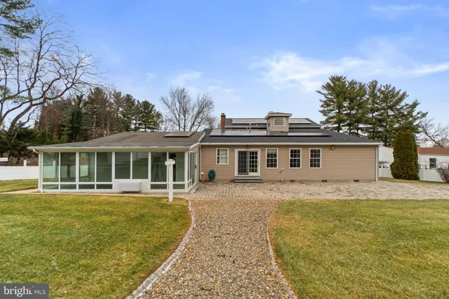 a view of a house with a swimming pool