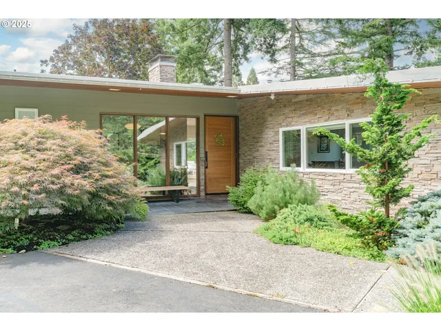 a view of a house with a garden