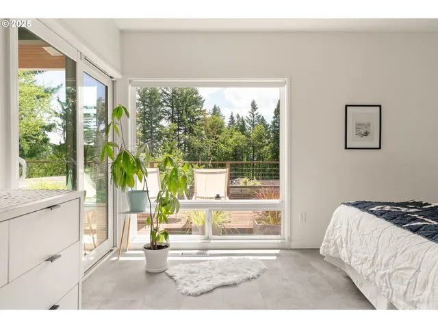 a bathroom with a shower sink and mirror