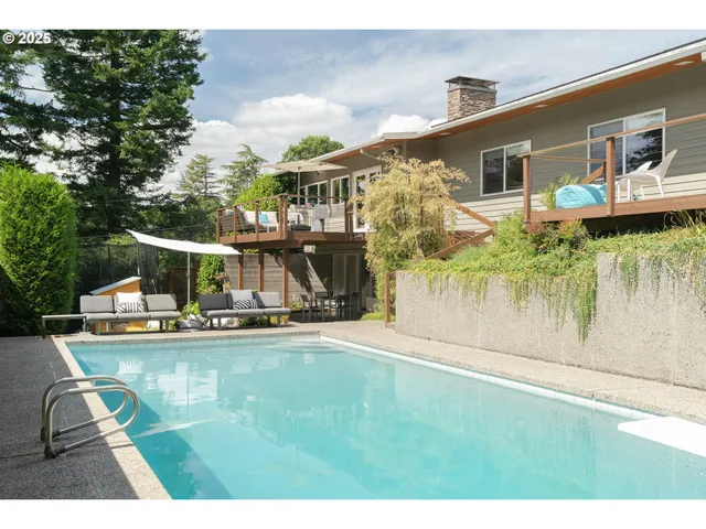 a view of house with patio outdoor kitchen