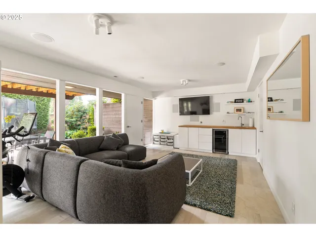 a living room with furniture and a couch