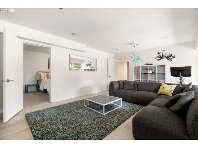 a bedroom with a bed and a cabinets