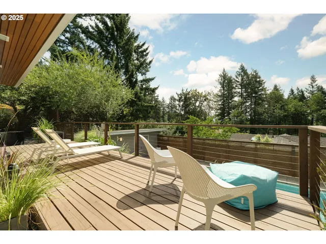 a view of a dinning table and chairs in patio
