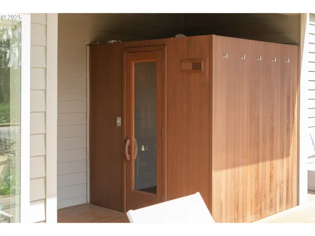 a view of backyard with patio