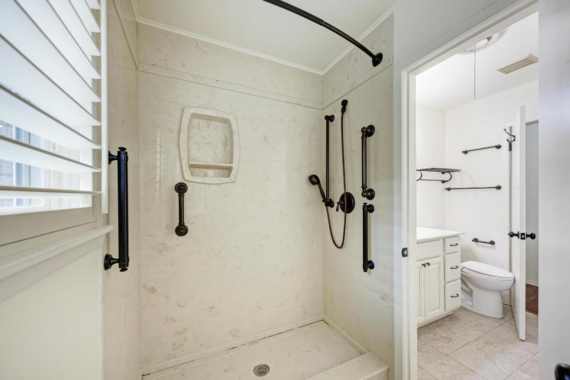 2500 Spring Creek Drive Austin, TX 78704 - Photo 23 of 40 a bathroom with a shower