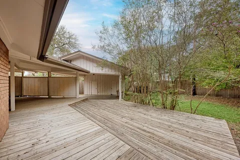 a view of livingroom with deck and yard