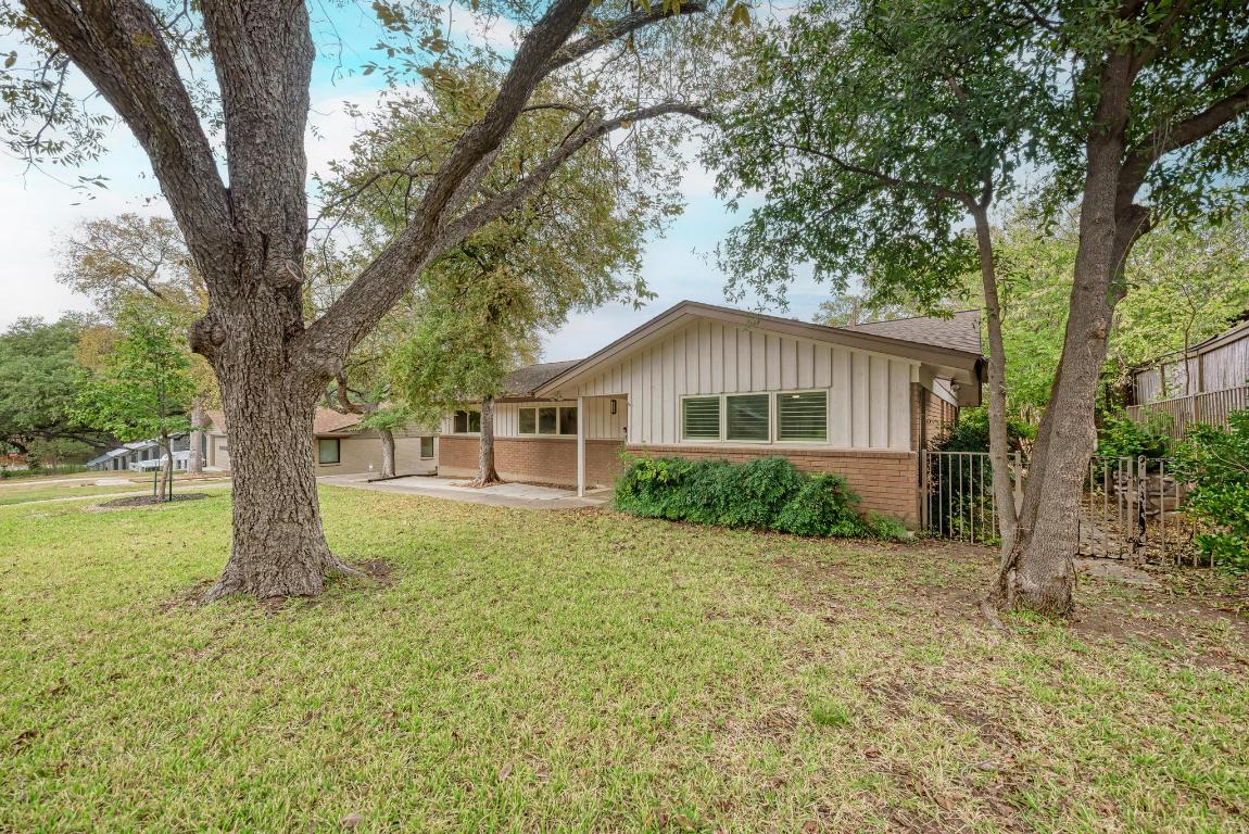 2500 Spring Creek Drive Austin, TX 78704 - Photo 7 of 40 a view of a house with backyard and garden