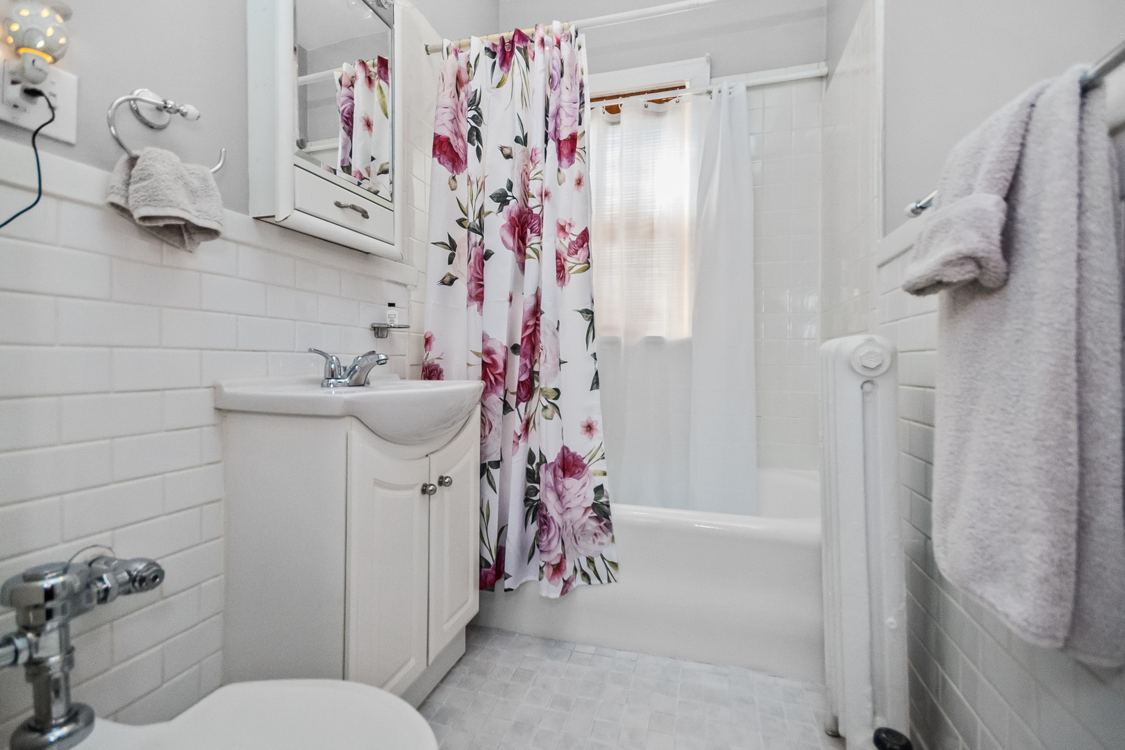 212 North Oak Park Avenue, Unit 2EE Oak Park, IL 60302 - Photo 10 of 15 a bathroom with a sink toilet and shower