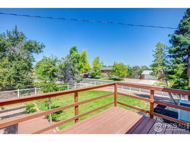 a bed room with a bed and a night stand
