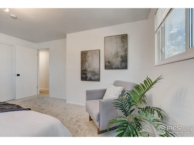 a view of room with a ceiling fan and window