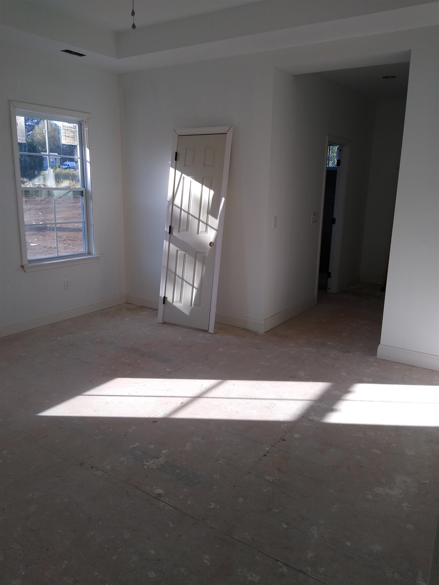 2107 Carpenter Bridge Road Columbia, TN 38401 - Photo 6 of 9 a view of an empty room and window
