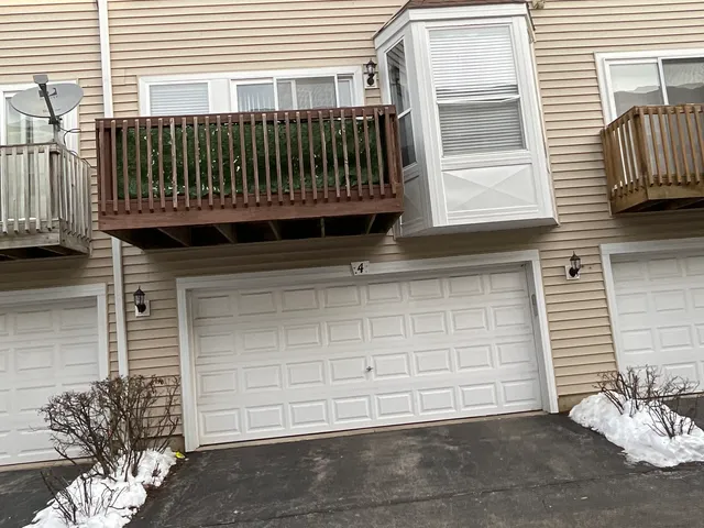 a view of a house with a small white door