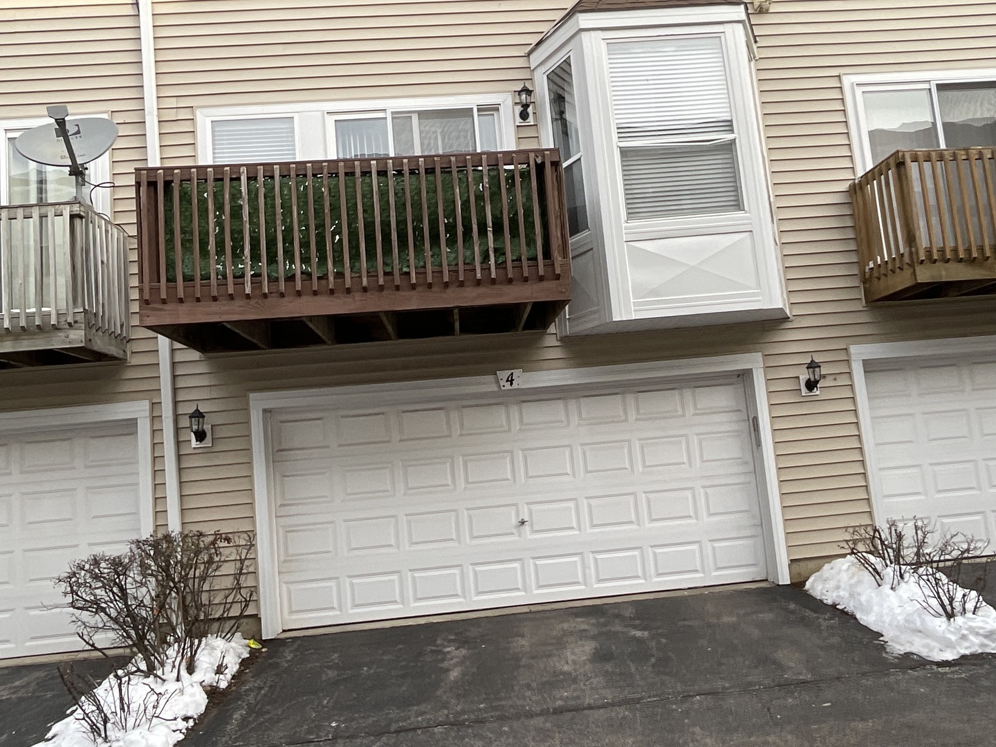 1116 Village Center Parkway, Unit 4 Aurora, IL 60506 - Photo 20 of 20 a view of a house with a small white door