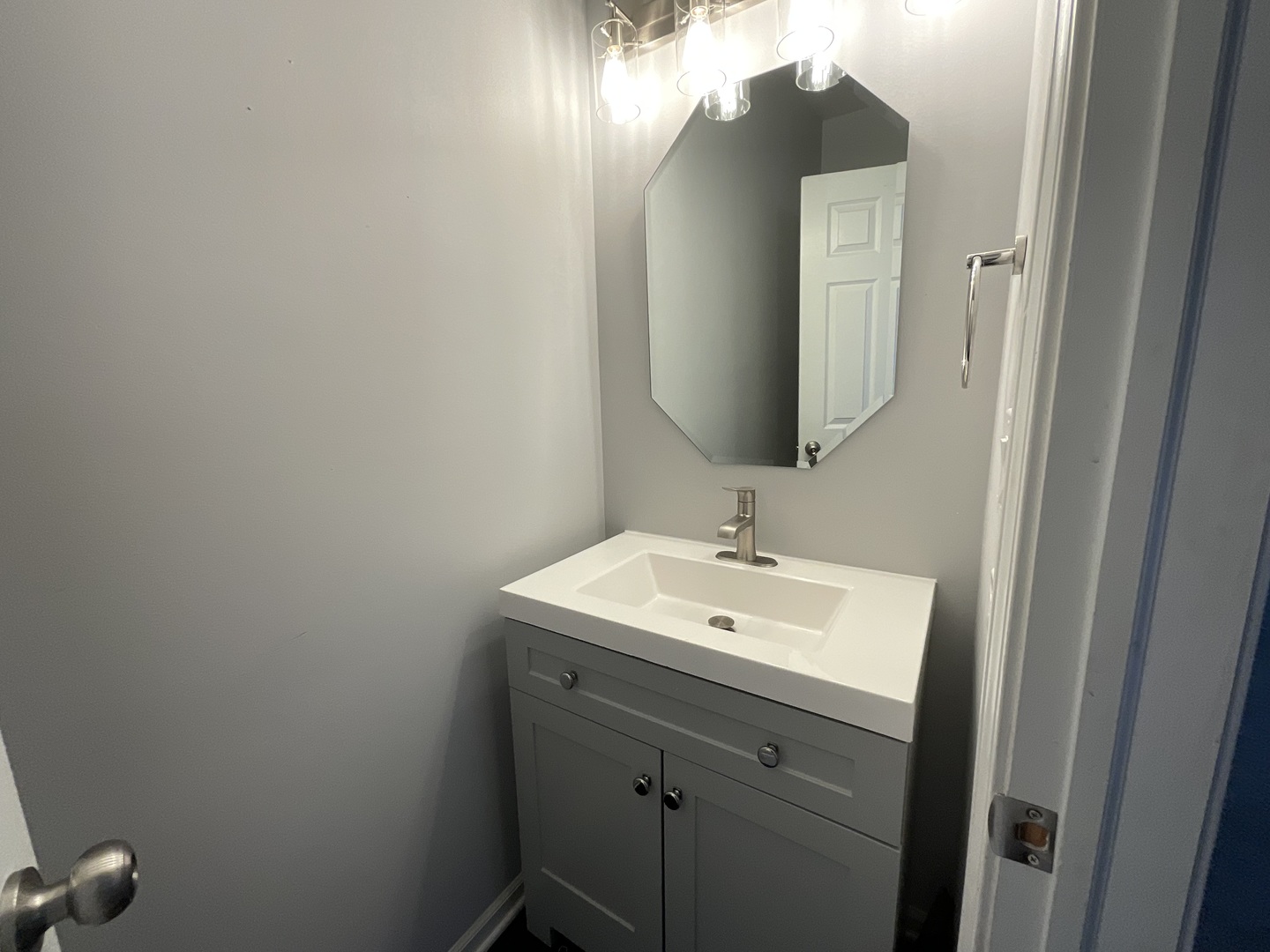 1116 Village Center Parkway, Unit 4 Aurora, IL 60506 - Photo 9 of 20 a bathroom with a sink and a mirror