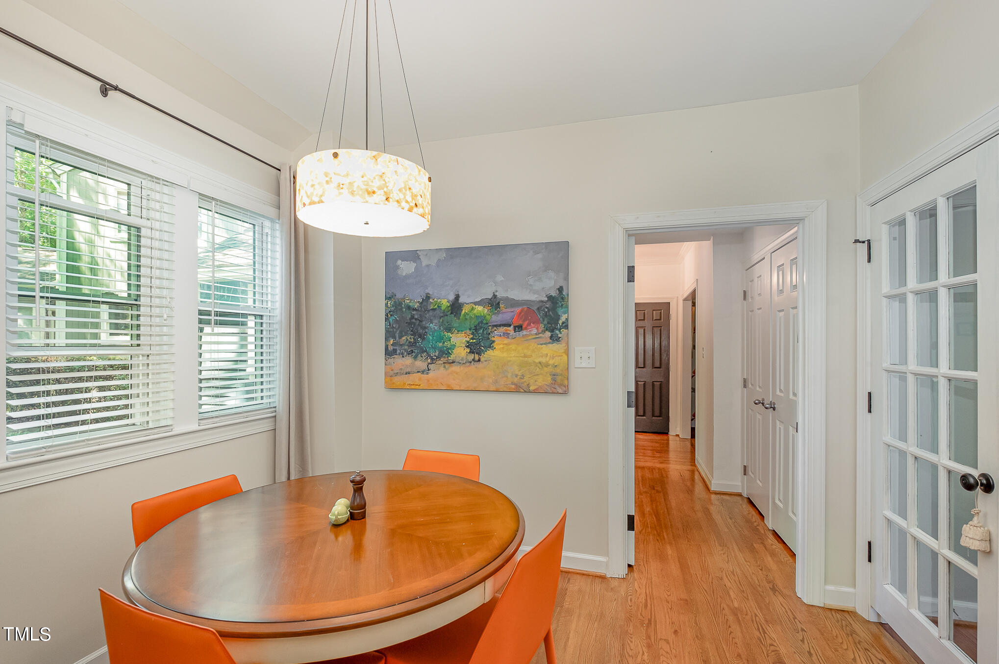 1715 Falls Church Road Raleigh, NC 27609 - Photo 11 of 19 a dining room with table and chairs