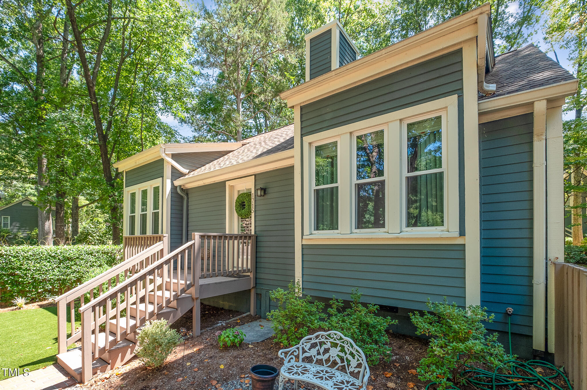 1715 Falls Church Road Raleigh, NC 27609 - Photo 3 of 19 a view of a house with backyard and porch