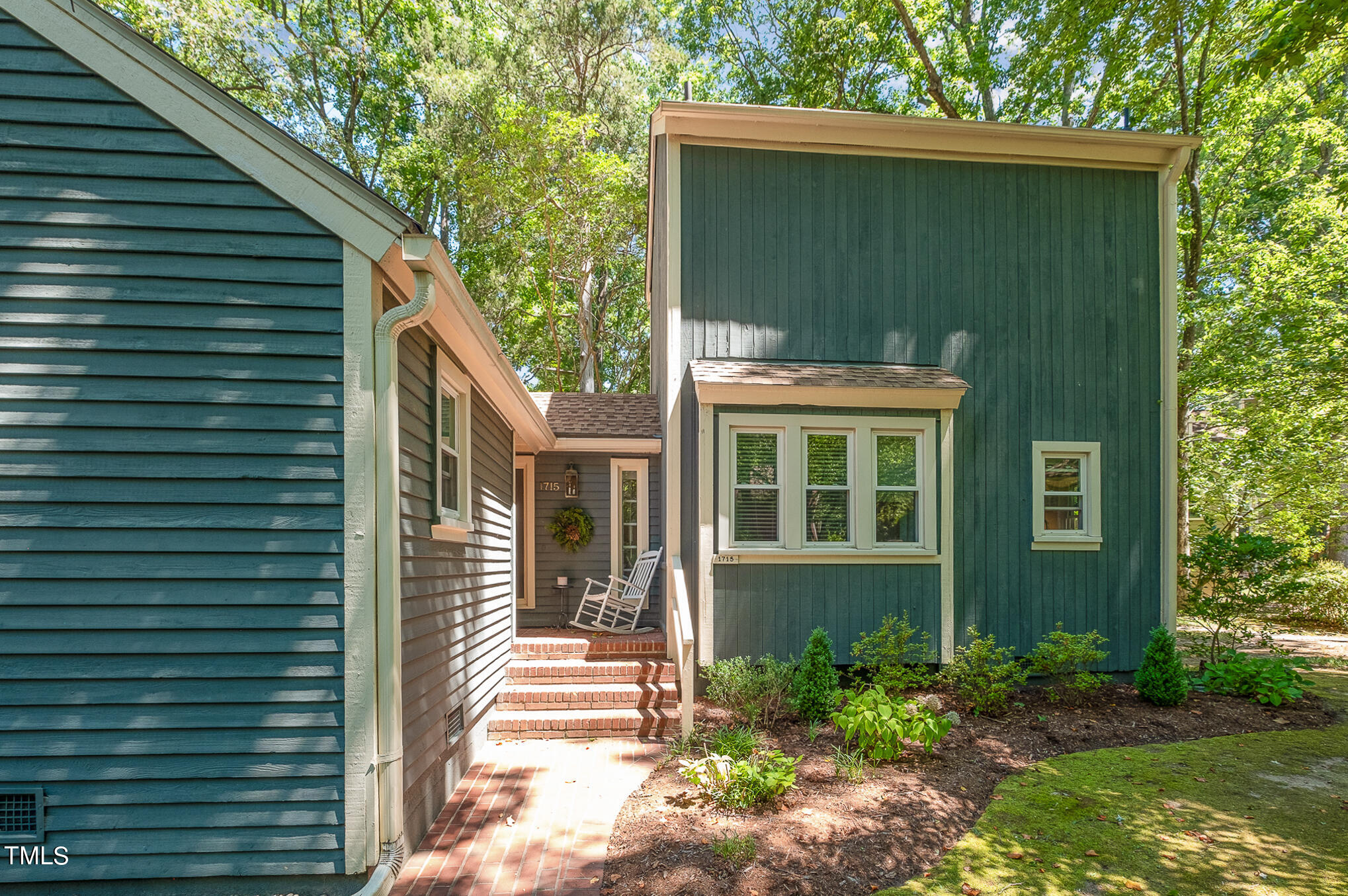 1715 Falls Church Road Raleigh, NC 27609 - Photo 5 of 19 a front view of a house with a yard