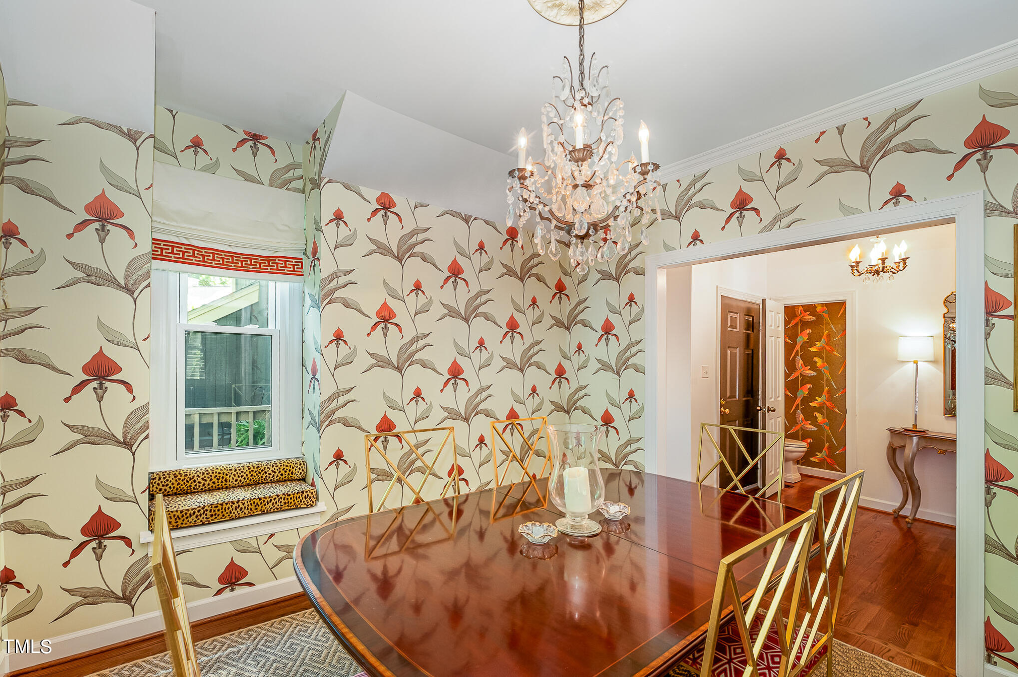 1715 Falls Church Road Raleigh, NC 27609 - Photo 9 of 19 a view of a dining room with furniture and chandelier