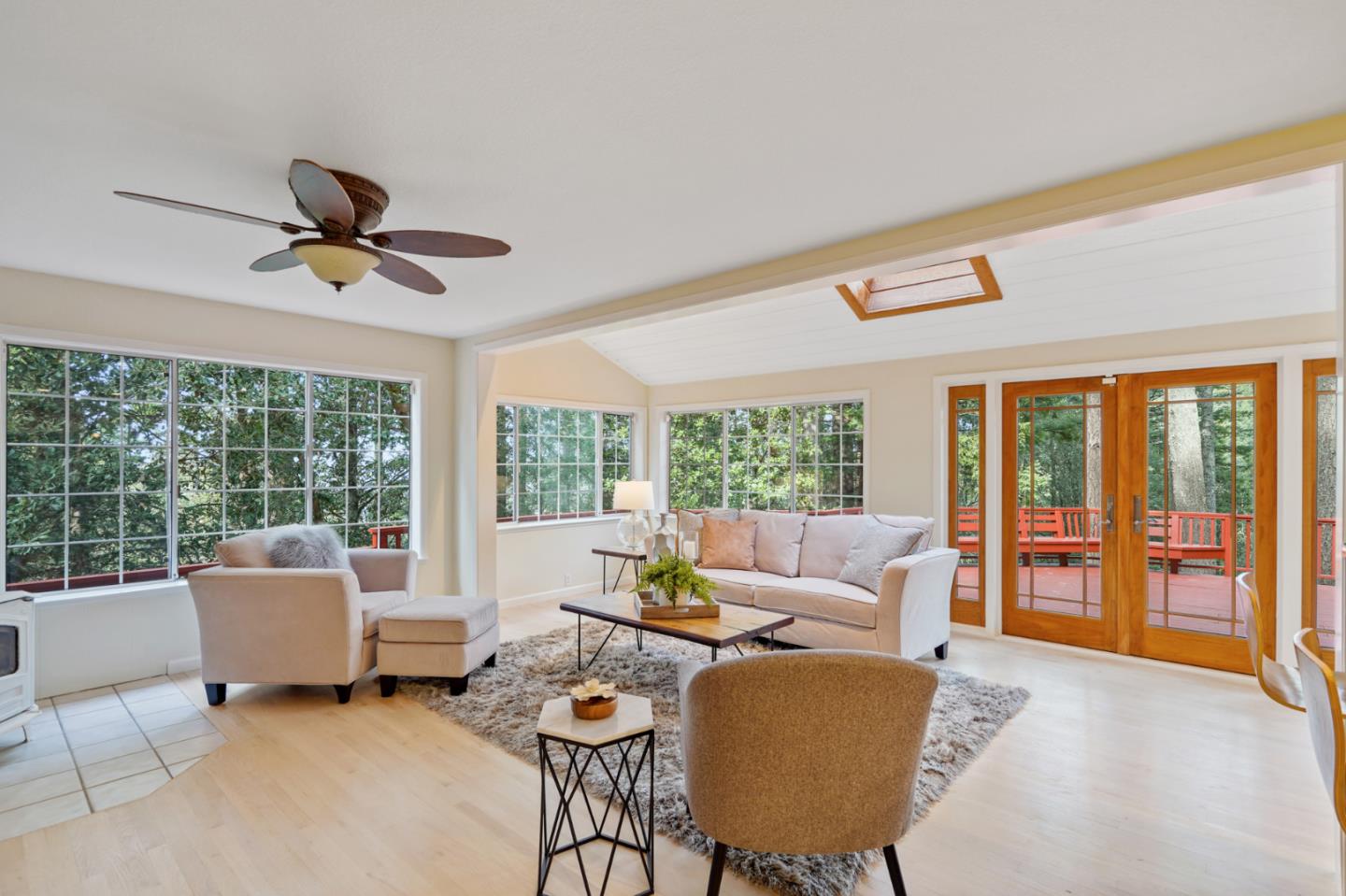 176 Swett Road Woodside, CA 94062 - Photo 16 of 39 a living room with furniture and large windows
