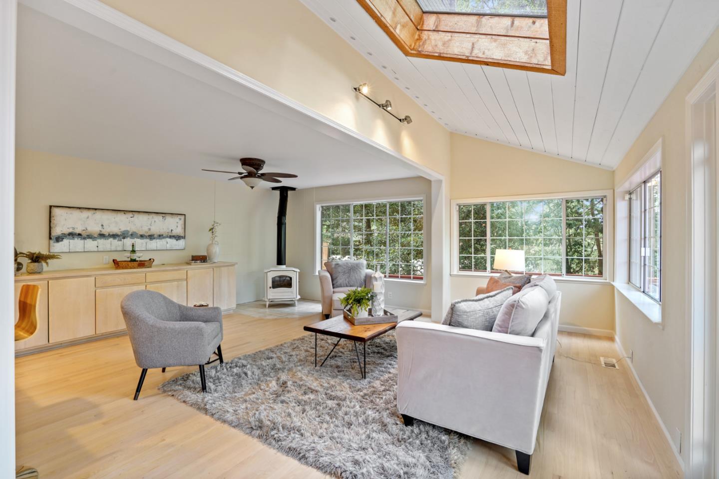 176 Swett Road Woodside, CA 94062 - Photo 17 of 39 a living room with furniture and a large window