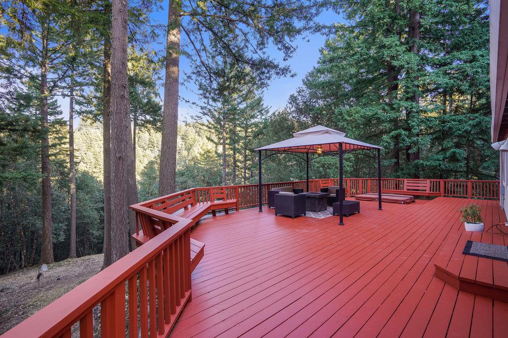 176 Swett Road Woodside, CA 94062 - Photo 2 of 39 a view of backyard with outdoor seating and wooden floor