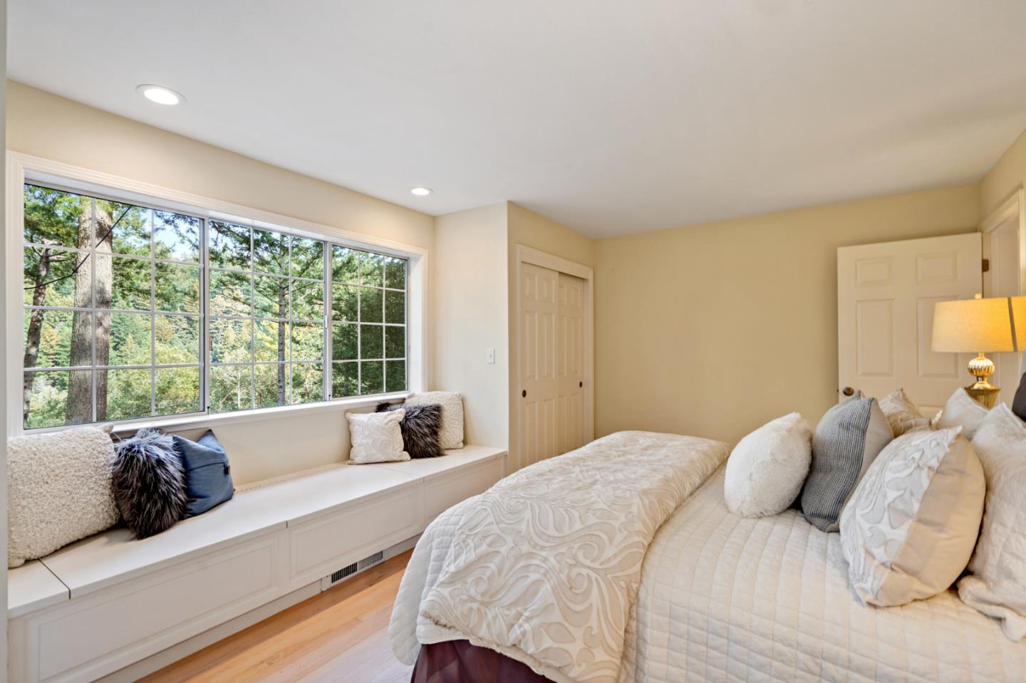 176 Swett Road Woodside, CA 94062 - Photo 22 of 39 a large bedroom with a bed and a large window