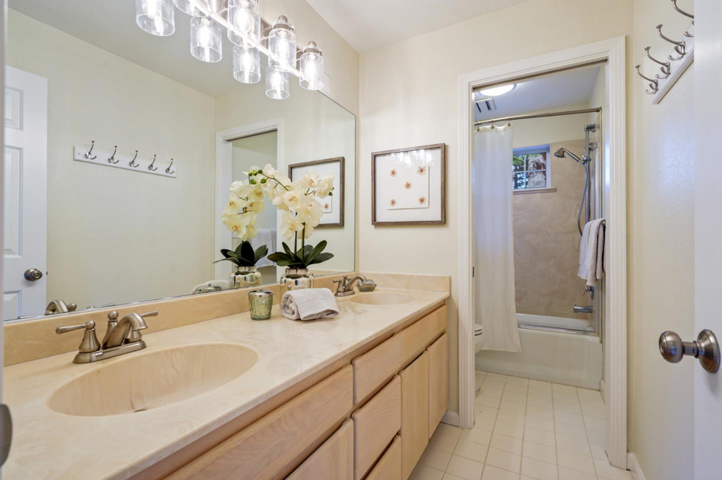 176 Swett Road Woodside, CA 94062 - Photo 24 of 39 a bathroom with a sink a vanity and a mirror