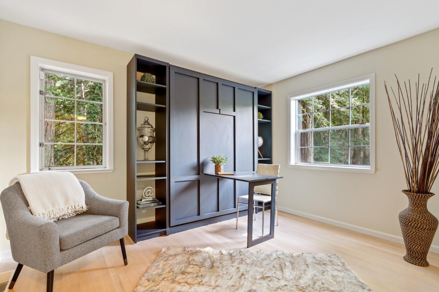176 Swett Road Woodside, CA 94062 - Photo 25 of 39 a living room with furniture and a window