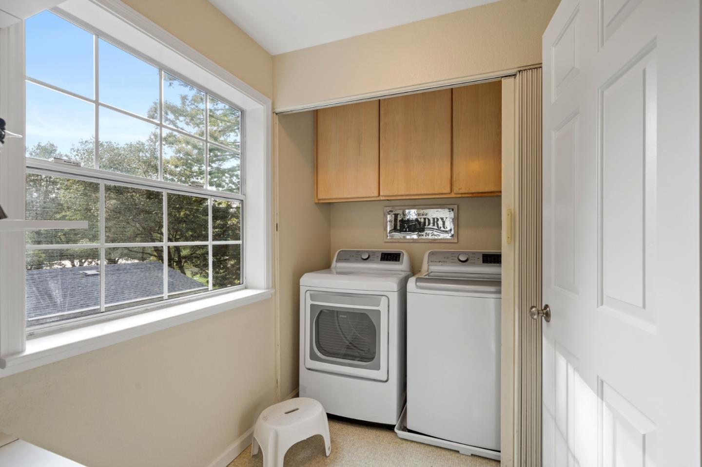 176 Swett Road Woodside, CA 94062 - Photo 28 of 39 a view of a kitchen with washer and dryer