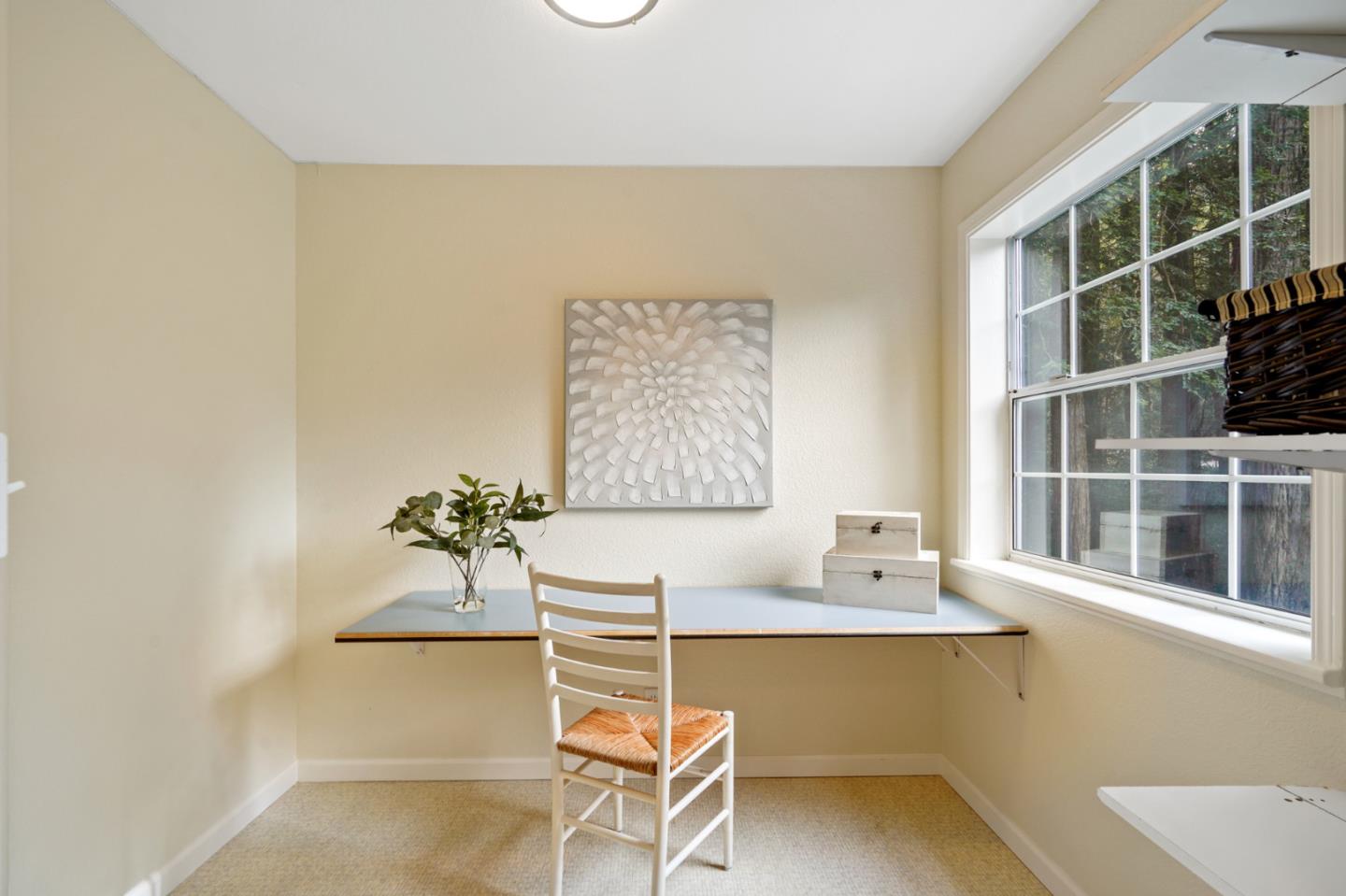 176 Swett Road Woodside, CA 94062 - Photo 29 of 39 a living room with a window and a table