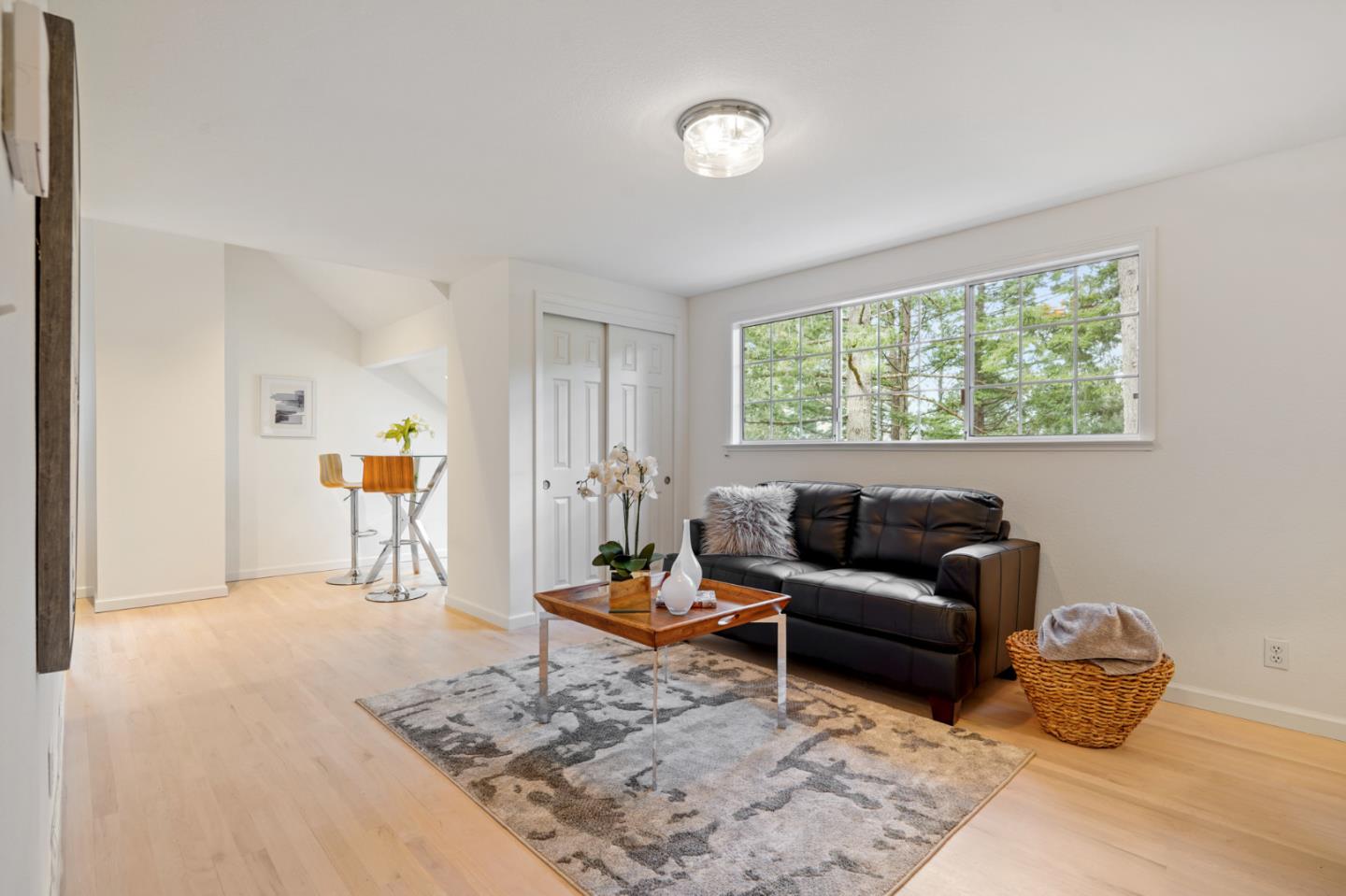 176 Swett Road Woodside, CA 94062 - Photo 31 of 39 a living room with furniture and a window