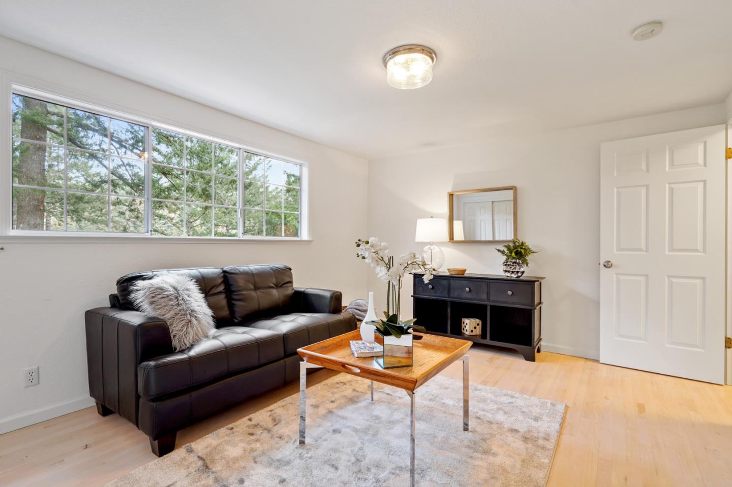 176 Swett Road Woodside, CA 94062 - Photo 32 of 39 a living room with furniture and a fireplace