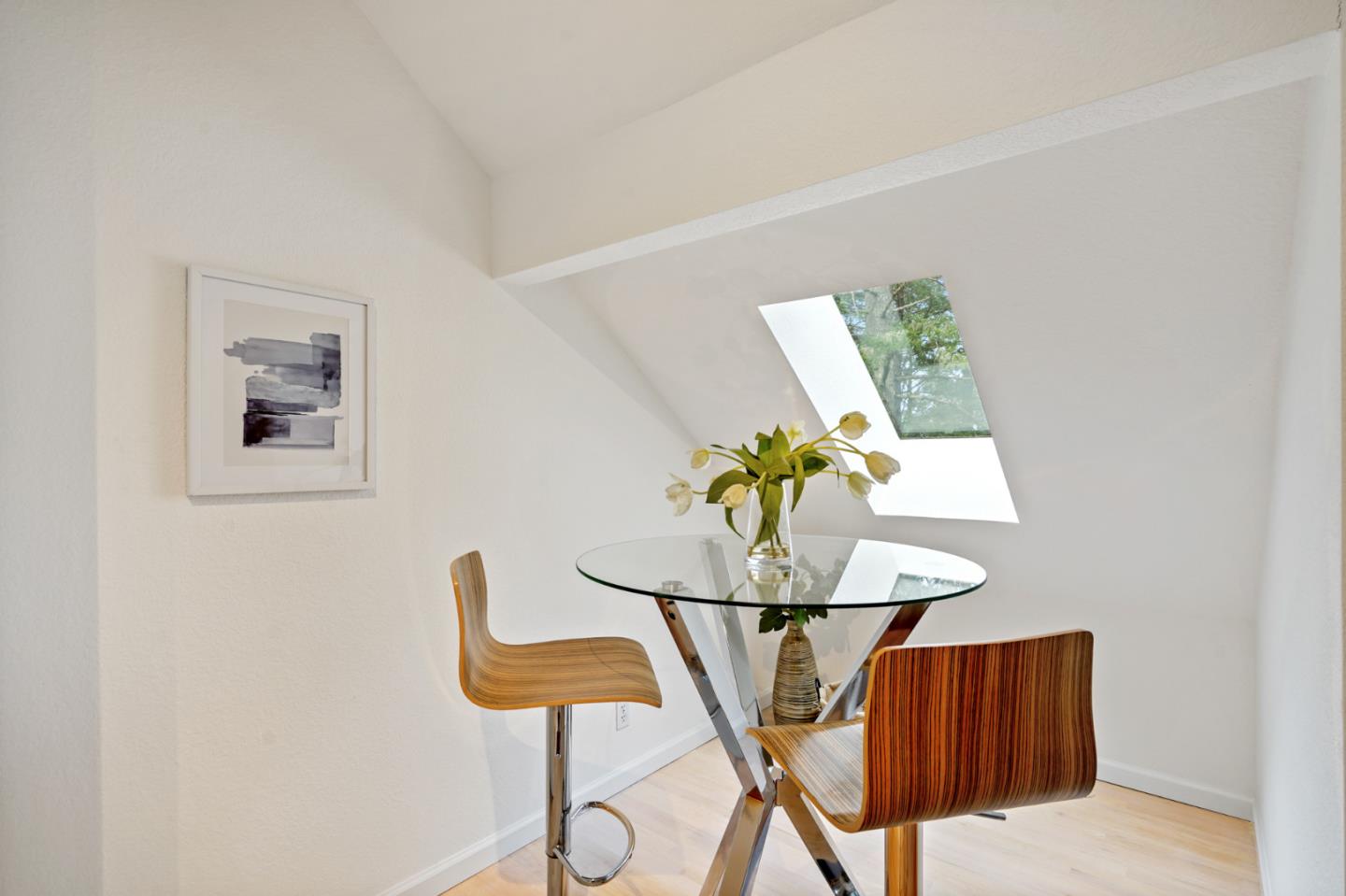 176 Swett Road Woodside, CA 94062 - Photo 33 of 39 a dining room with furniture and a potted plant