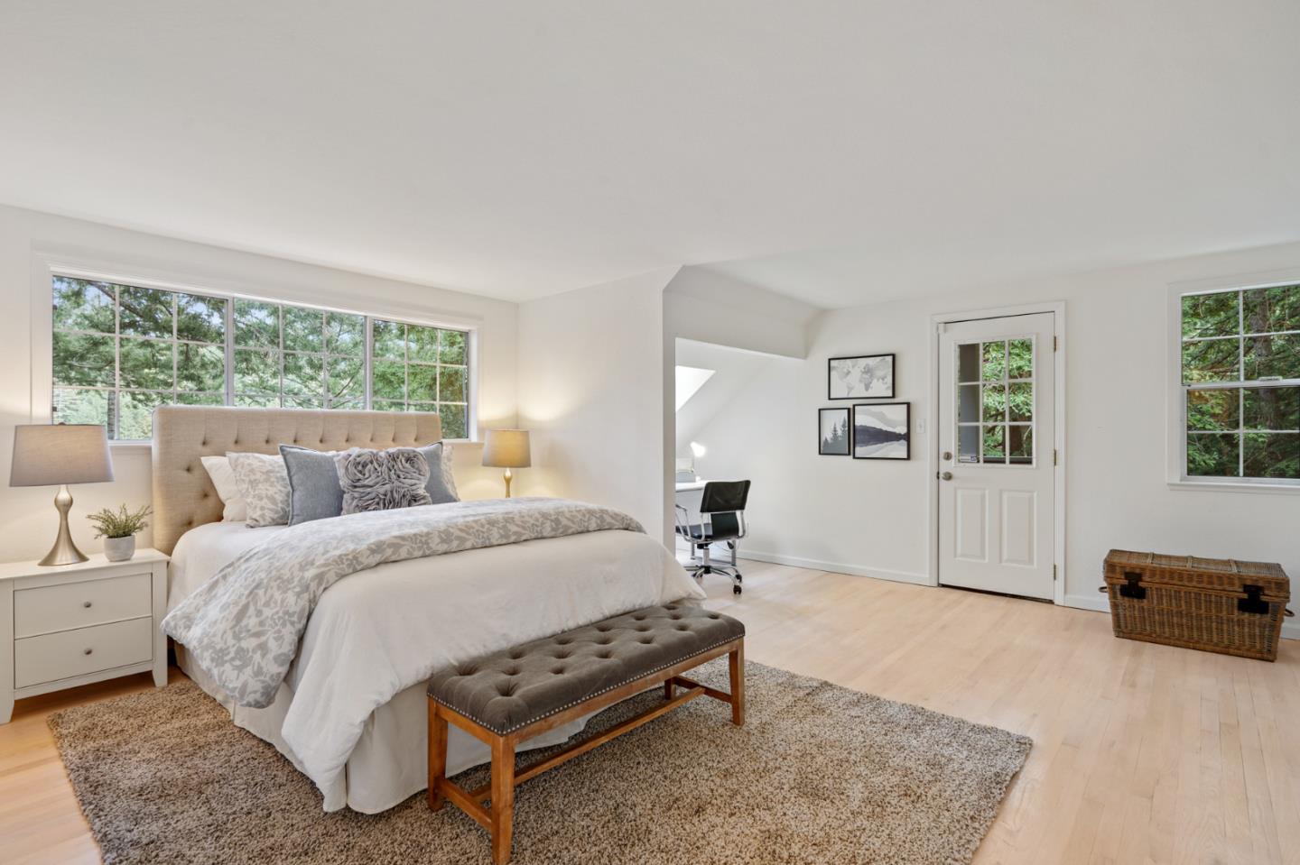176 Swett Road Woodside, CA 94062 - Photo 37 of 39 a spacious bedroom with a bed a table and chair
