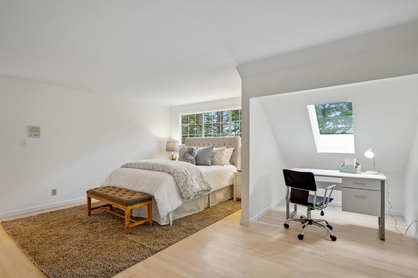 176 Swett Road Woodside, CA 94062 - Photo 38 of 39 a bedroom with a bed a table and chair