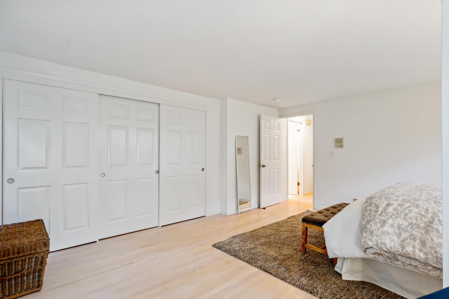 176 Swett Road Woodside, CA 94062 - Photo 39 of 39 a living room with a bed furniture and a rug