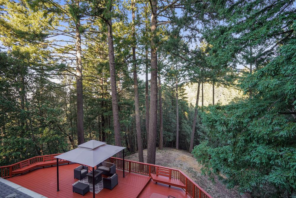 176 Swett Road Woodside, CA 94062 - Photo 4 of 39 a view of swimming pool with chairs and wooden fence