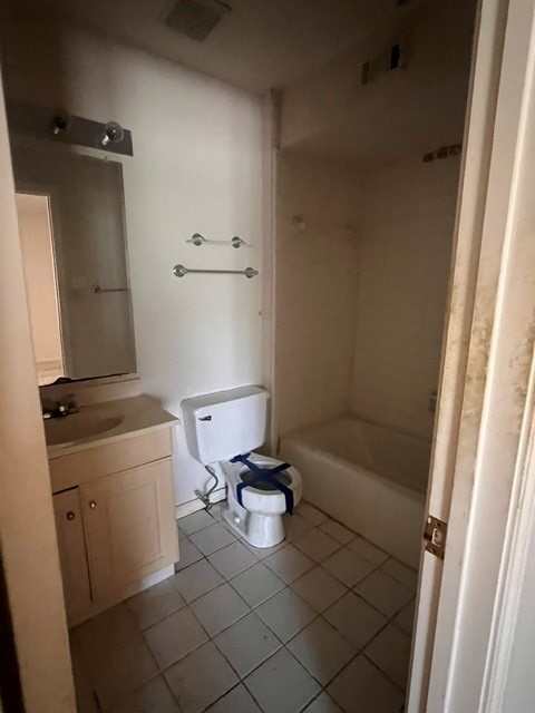 6304 South Rice Avenue Bellaire, TX 77401 - Photo 16 of 16 a bathroom with a sink toilet and shower