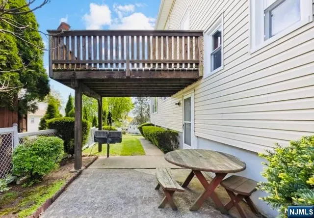 a view of a table and chairs in patio