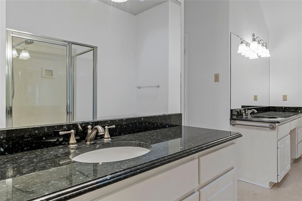3133 Chimney Hill Drive Waco, TX 76708 - Photo 11 of 29 a bathroom with a granite countertop sink and a mirror