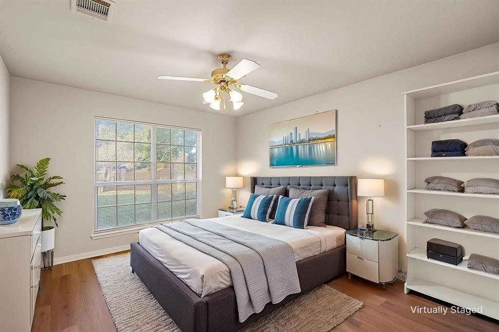 3133 Chimney Hill Drive Waco, TX 76708 - Photo 17 of 29 a spacious bedroom with a large bed and a window